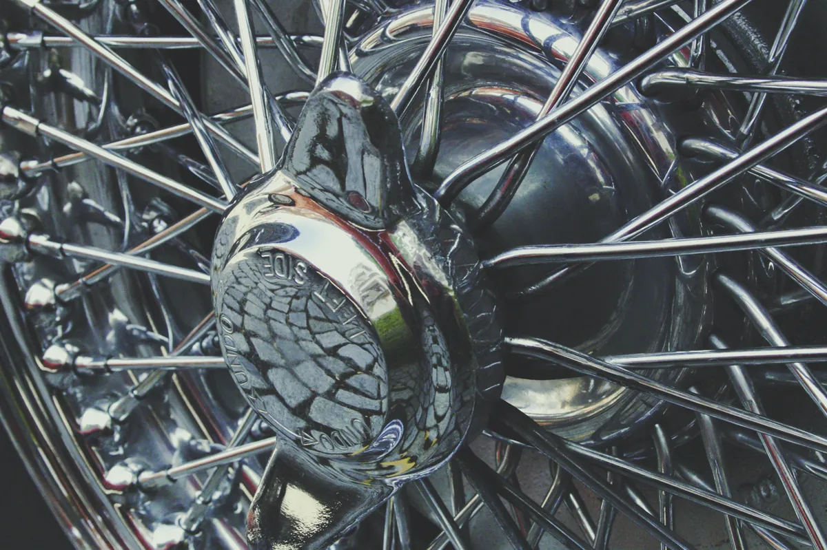 Macro detail of a chrome wire wheel